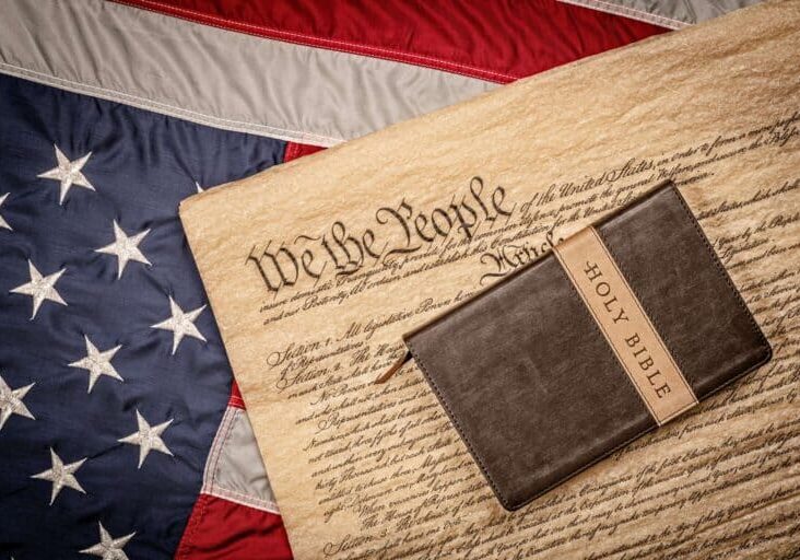 holy-bible-on-constitution-and-american-flag-2023-11-27-05-02-56-utc